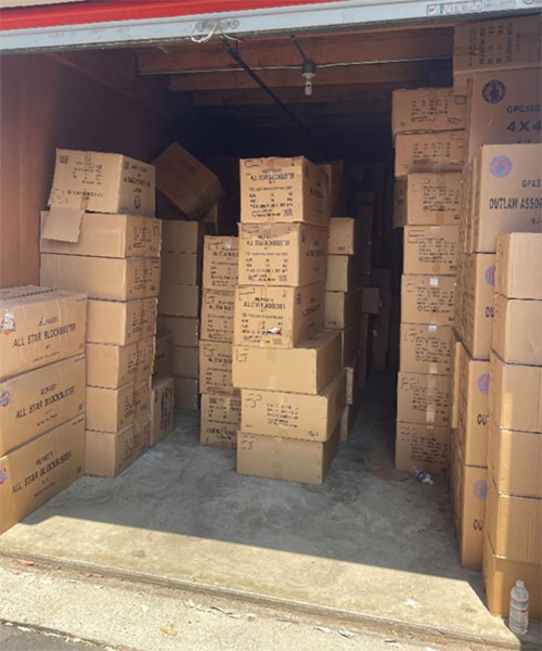 boxes of seized illegal fireworks in a storage locker