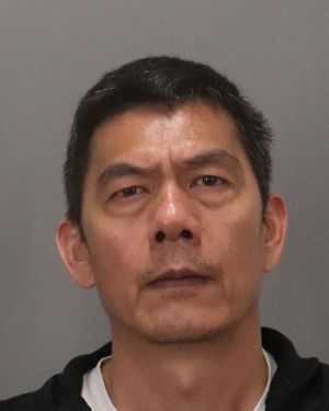Suspect Zhiqiang Liu 53YO