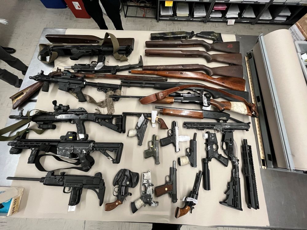 Photographs of multiple firearms