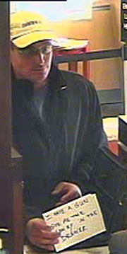 Suspect photo with demand note