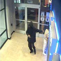 Surveillance Camera Image #2, Victim and Assailant