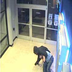 Surveillance Camera Image #5, Victim and Assailant