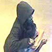 Surveillance Camera Image #6, Victim and Assailant